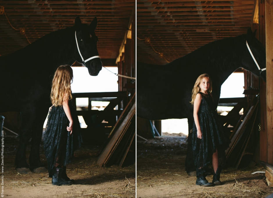 Teslyn - Young Girl in Black Dress in Horse Stable