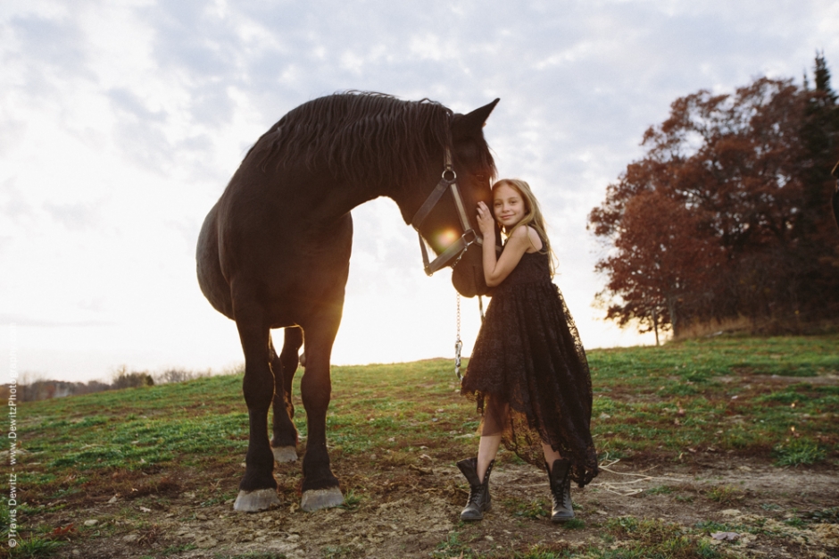 Teslyn - Young Happy Girl Hugging Horse