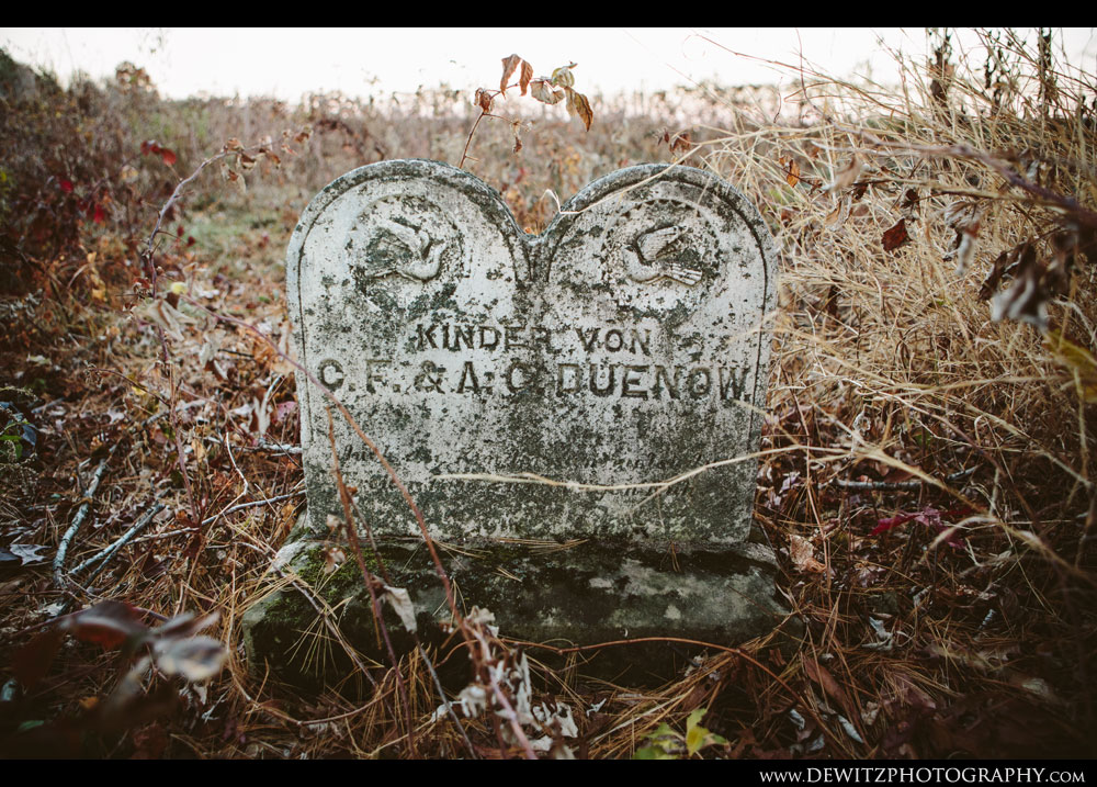 Dual Headstones in Wooded Cemetery