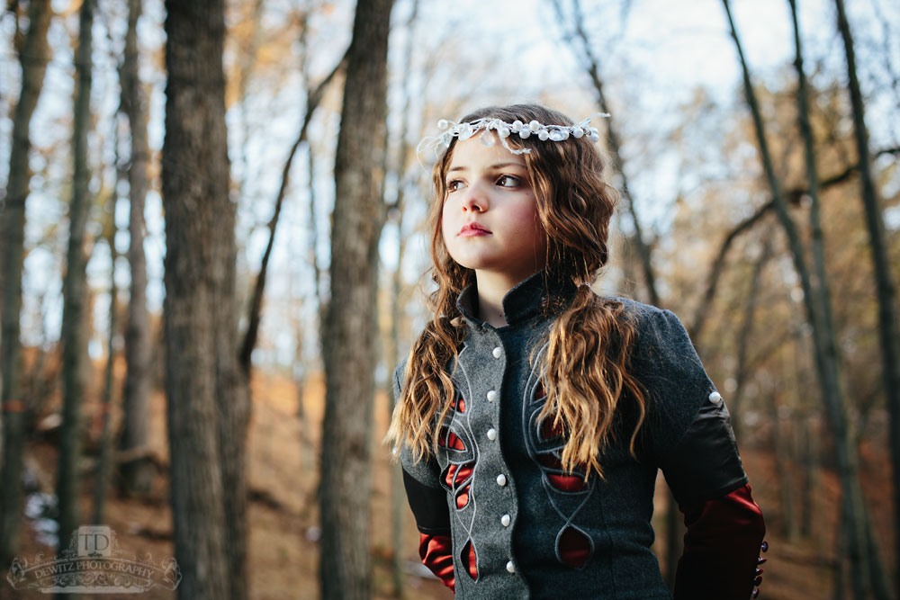 Child Model with Head Piece on in the Woods