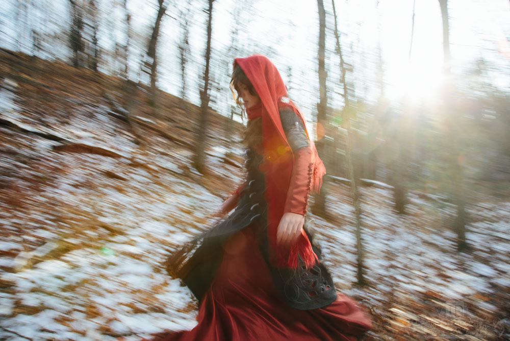 Red Riding Hood on the Move Through the Woods