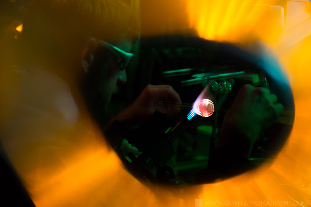 christensen_glass_making_marble_looking_through_green_lens