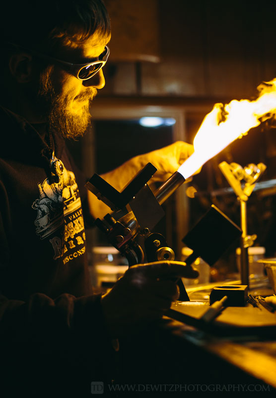 christensen_glass_red_glow_from_large_flame_during_glass_making