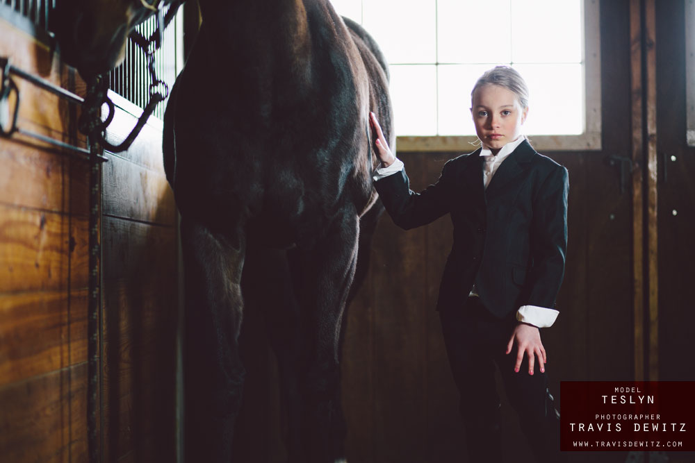 teslyn_english_horse_rider_outfit_in_stable_touching_horse_web