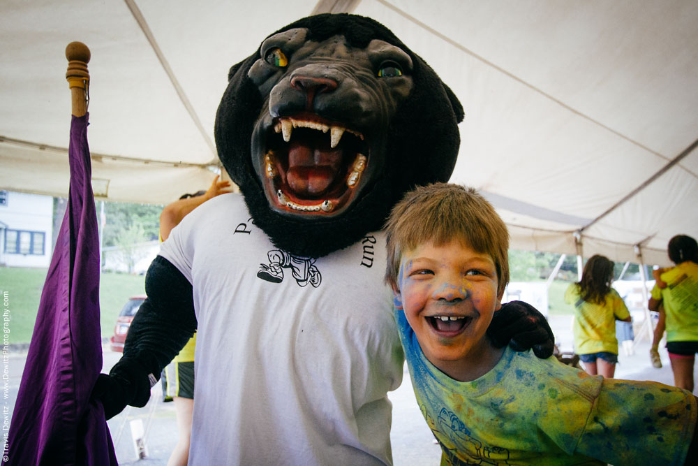 panther_color_run_kid_laughing_with_panther_mascot