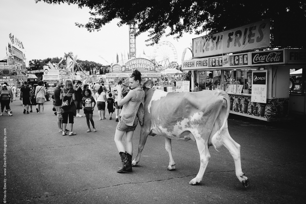 Northern Wisconsin State Fair Girl Walking Her Cow Past Fry Stand