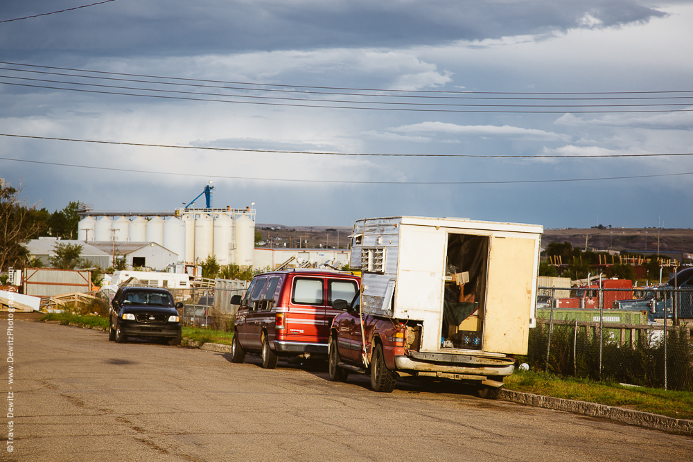 Oil Worker Reading in Truck Camper - Williston, ND