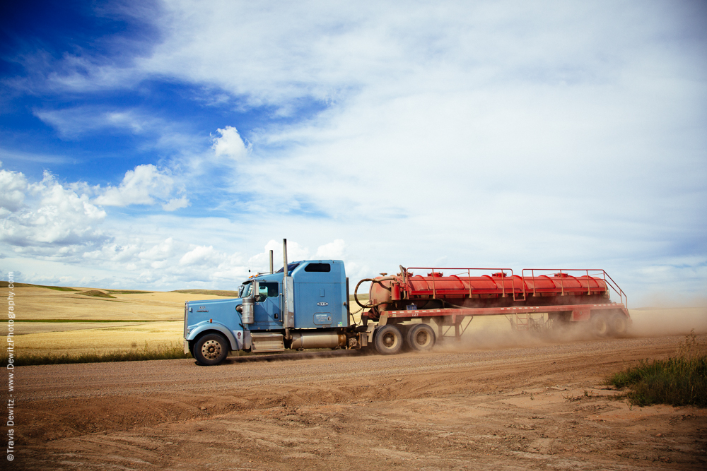 Tanker Flies Down Dirt Road