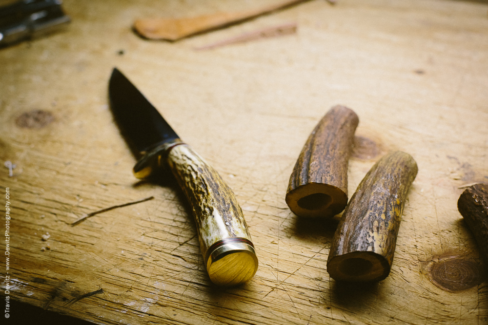 Finished Bruner Knife Next to Antler Knife Handle Blanks