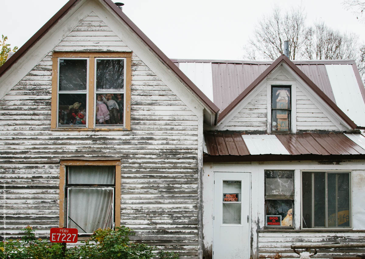 eerie-house-dolls-in-windows-meridean-wi-historic-city-series