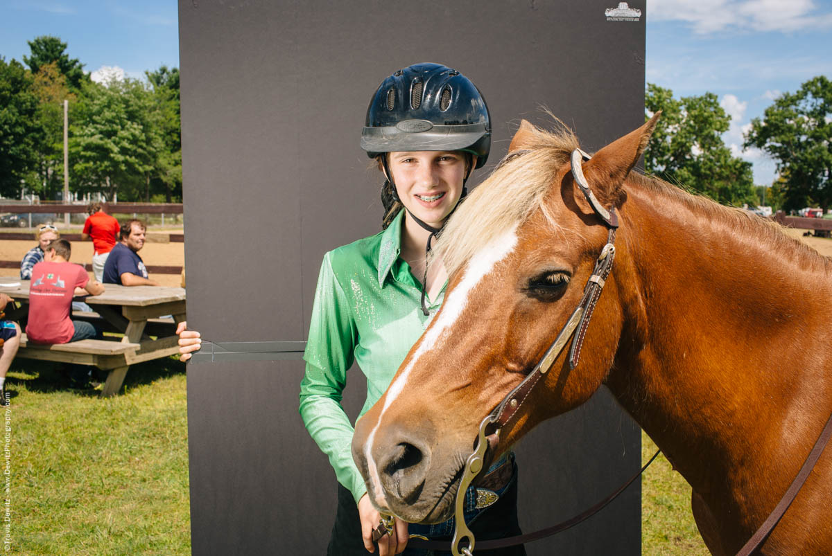 girl-poses-with-her-horse-at-arena-northern-wisconsin-state-fair-2009