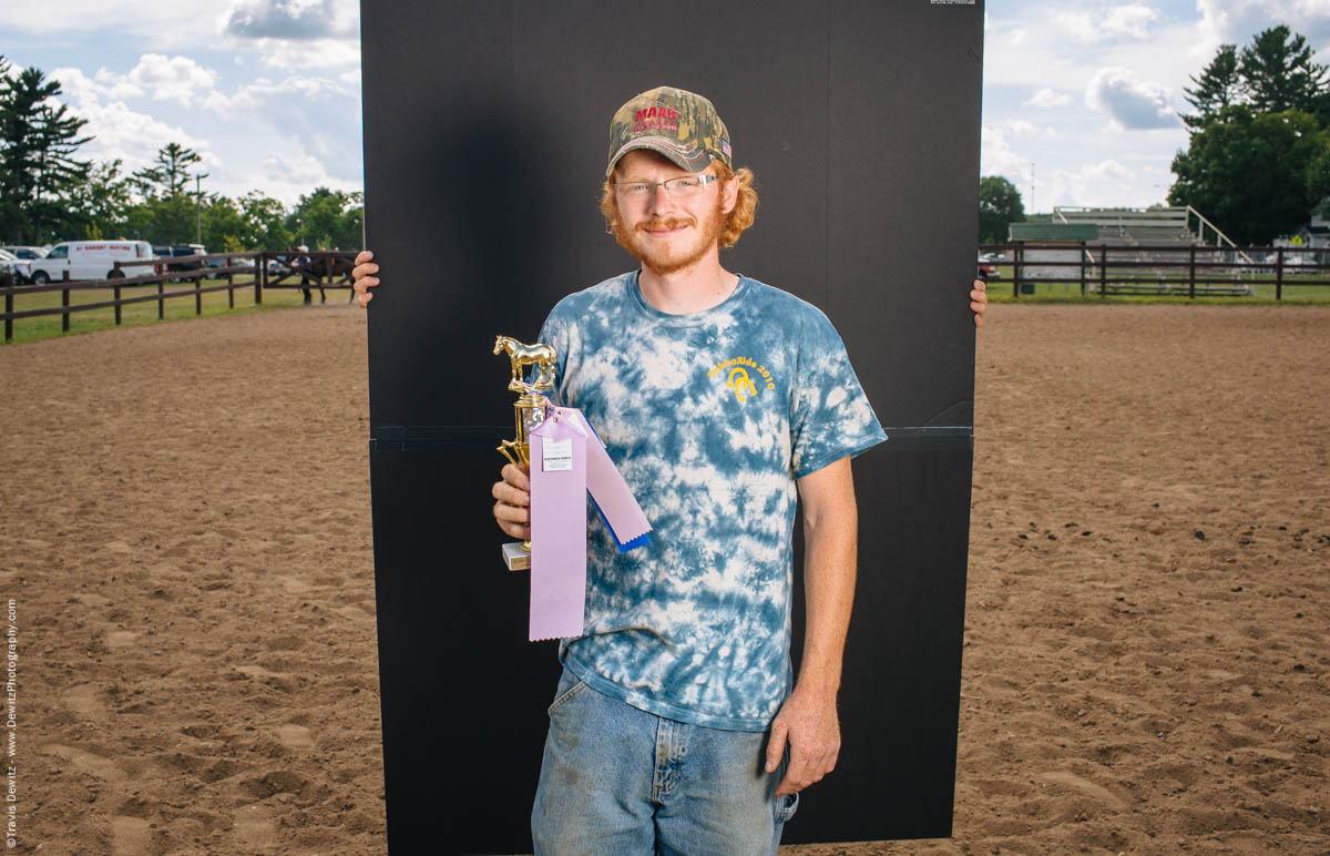 male-horse-riding-winner-in-arena-portrait-northern-wisconsin-state-fair-2234