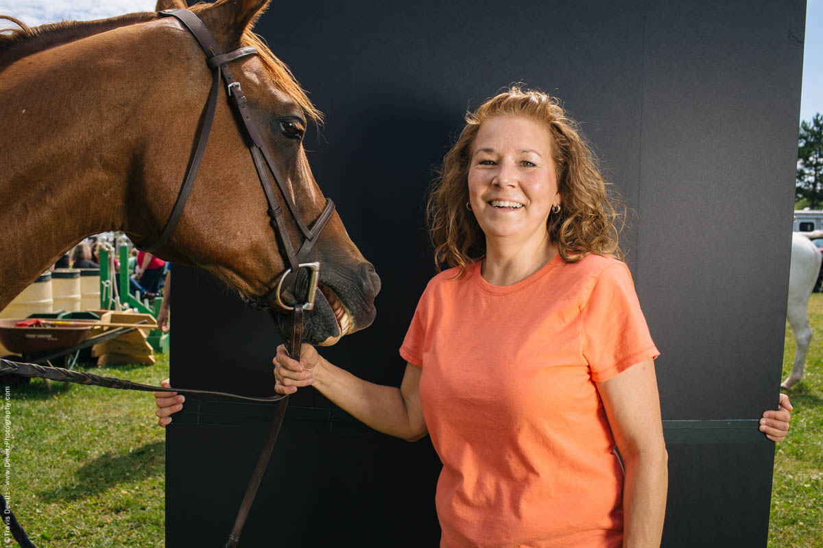 woman-holding-smiling-horse-portrait-northern-wisconsin-state-fair-1846