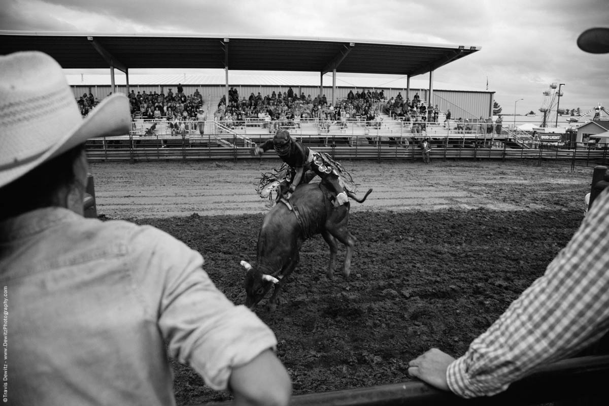 bull-rider-flies-in-air-jackson-county-fair-mud-4705