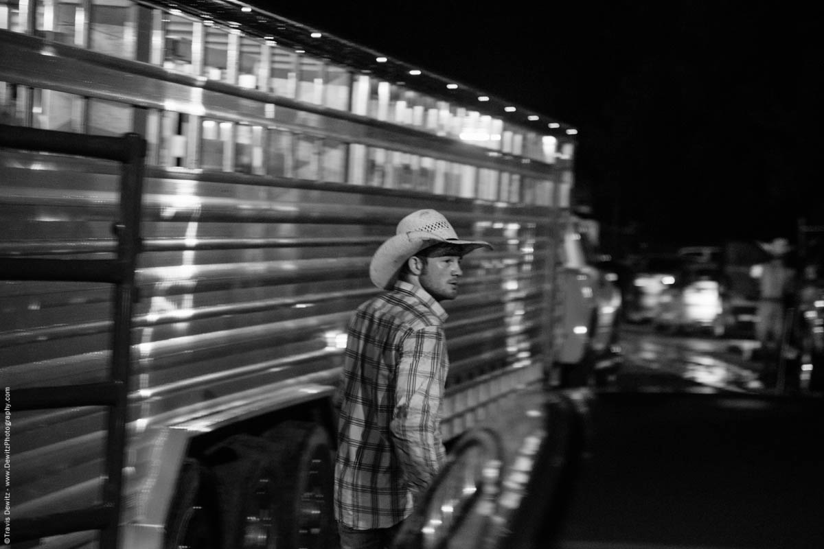 cowboy-walks-past-cattle-trailer-5715