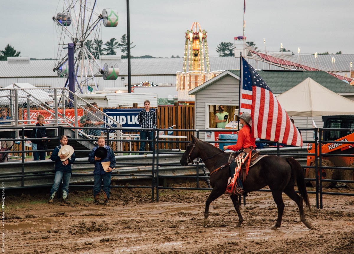 girl-on-horse-runs-american-flag-national-anthem-jackson-county-fair-black-river-falls-wi-4627